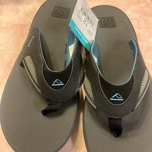 New Reef Men’s Sandals beach Flip Flops black blue 12 w/ Bottle Opener